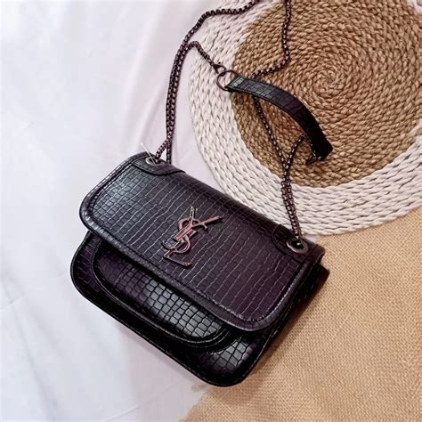 tas ysl croco